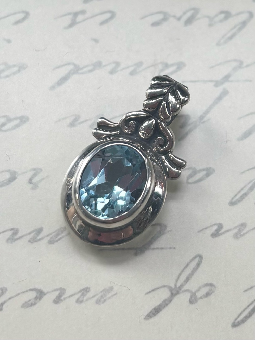 Sterling Silver Blue Topaz Oval Bali Pendant